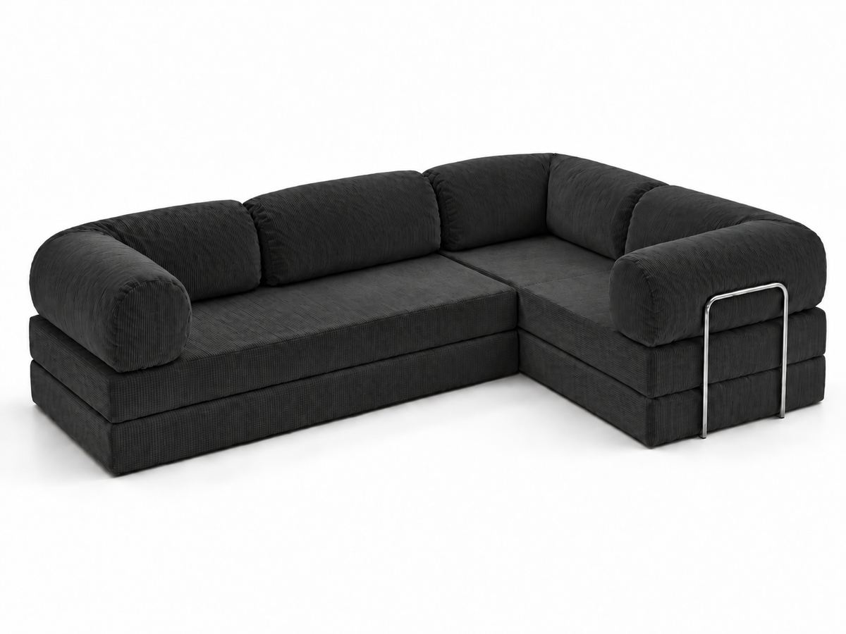 An elevated three-quarter view of the Confex Corner Black Sofa reveals the L-shaped seat arrangement, dark upholstered cushions and rounded end sections accented with slim rectangular metal details.