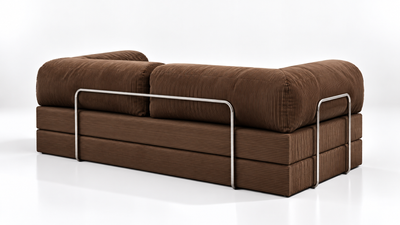 Detailed view of the Confex Brown Sofa showcasing its low profile structure, plush back cushions and warm chocolate brown fabric, combining relaxed comfort with understated modern styling.