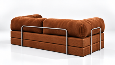 Detailed perspective of the Confex Orange Sofa showcasing its distinctive corduroy texture, cushioned backrest and low profile design with softly curved edges for a modern living room.