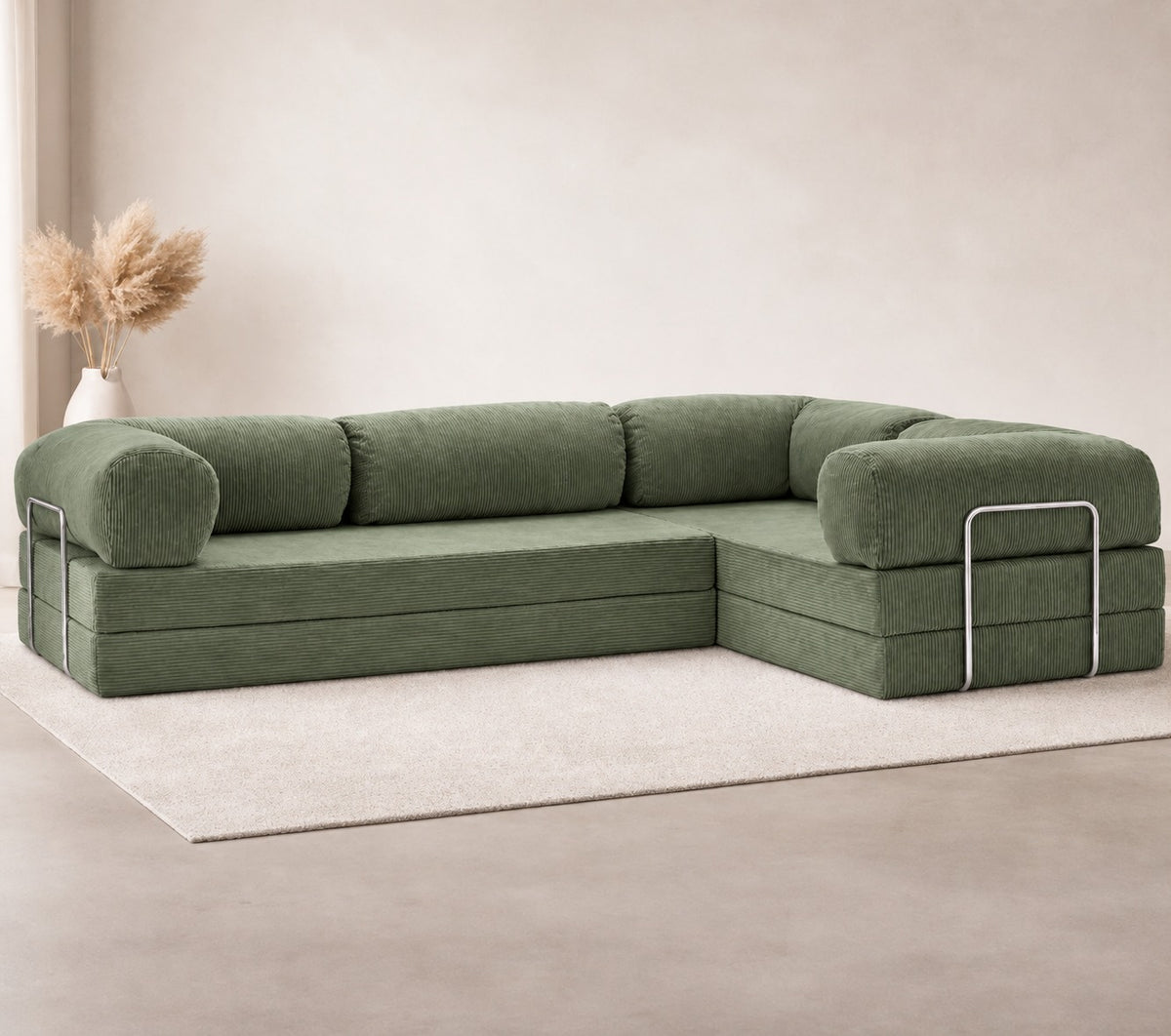 Confex Corner Green Sofa displayed in a minimalist living room with olive green corduroy upholstery, rounded armrests, plush cushions, neutral walls and a soft beige rug.