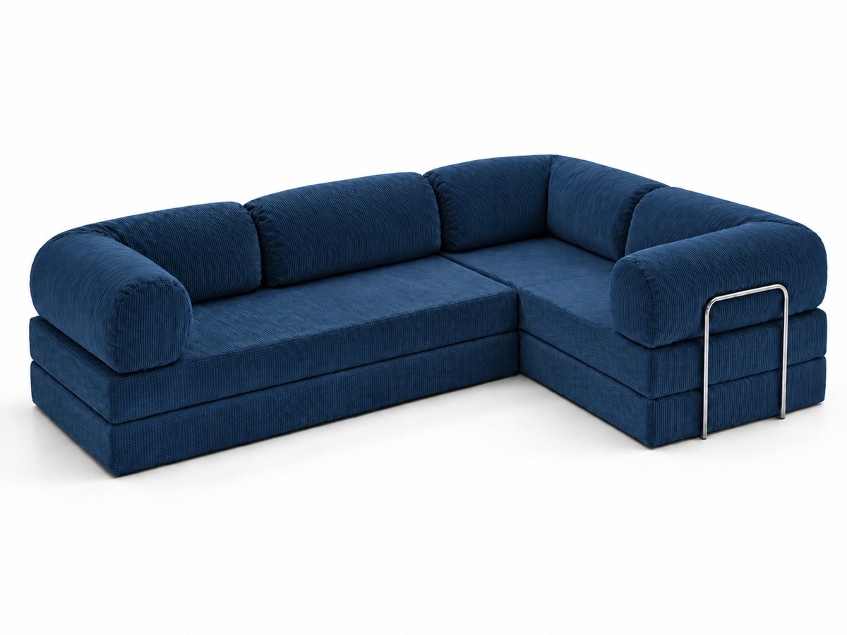 An angled studio image reveals the Confex Corner Blue Sofa seating arrangement, showing the adjoining corner sections, padded blue back cushions and curved outer arms with slender metallic detailing.